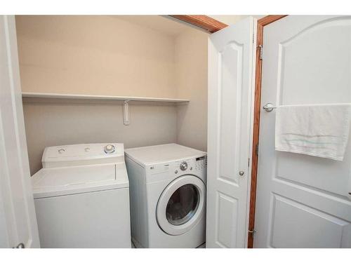 7 Fern Glade Crescent, Sylvan Lake, AB - Indoor Photo Showing Laundry Room