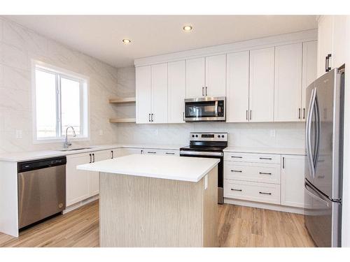 38 Bardwell Way, Sylvan Lake, AB - Indoor Photo Showing Kitchen With Stainless Steel Kitchen With Upgraded Kitchen