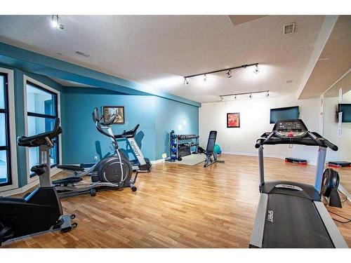 313-5110 36 Street, Red Deer, AB - Indoor Photo Showing Gym Room