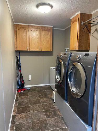 5124 51 Street, Consort, AB - Indoor Photo Showing Laundry Room