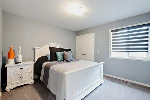 102 Caribou Crescent, Red Deer, AB - Indoor Photo Showing Bedroom