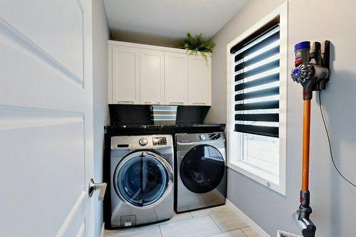 102 Caribou Crescent, Red Deer, AB - Indoor Photo Showing Laundry Room