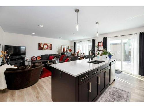 50 Iron Gate Boulevard, Sylvan Lake, AB - Indoor Photo Showing Kitchen With Double Sink
