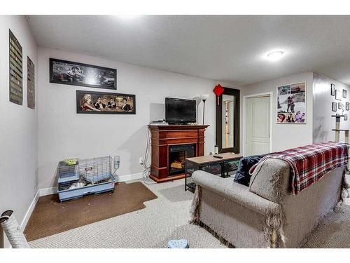 35 Odell Green, Red Deer, AB - Indoor With Fireplace