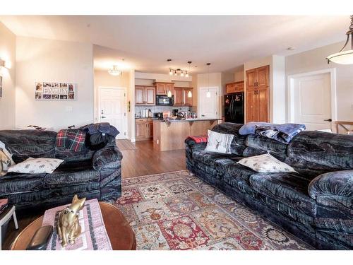 306-5213 61 Street, Red Deer, AB - Indoor Photo Showing Living Room