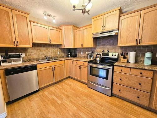 108-600 6 Street Street Sw, Slave Lake, AB - Indoor Photo Showing Kitchen