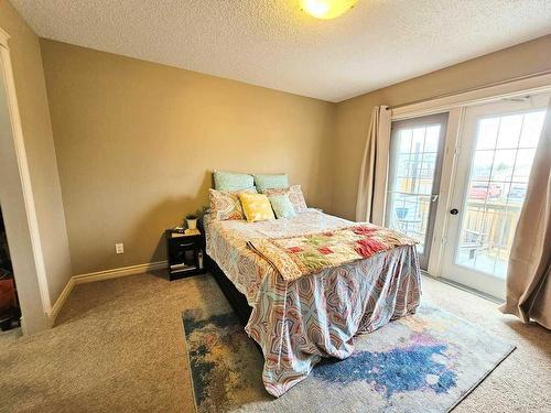 108-600 6 Street Street Sw, Slave Lake, AB - Indoor Photo Showing Bedroom
