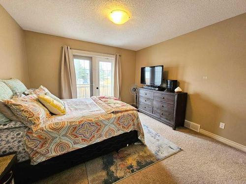 108-600 6 Street Street Sw, Slave Lake, AB - Indoor Photo Showing Bedroom