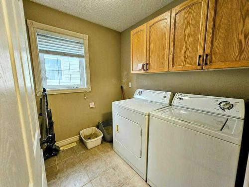 108-600 6 Street Street Sw, Slave Lake, AB - Indoor Photo Showing Laundry Room