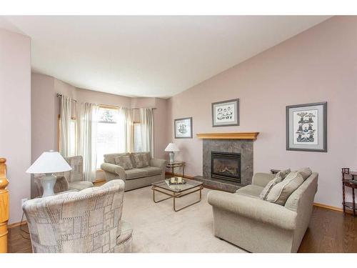 89 Hathaway Lane, Lacombe, AB - Indoor Photo Showing Living Room With Fireplace