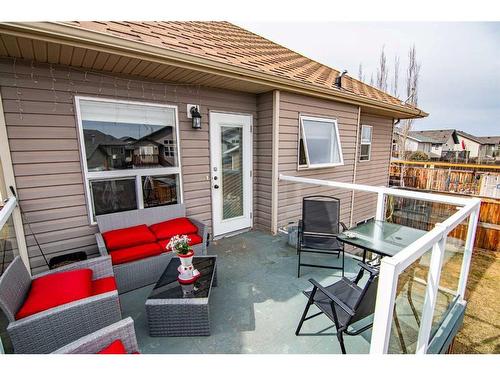 54 Mcdougall, Penhold, AB - Outdoor With Deck Patio Veranda With Exterior