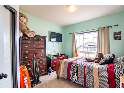 54 Mcdougall, Penhold, AB - Indoor Photo Showing Bedroom