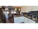 605-339 Viscount Drive, Red Deer, AB  - Indoor Photo Showing Kitchen With Double Sink 