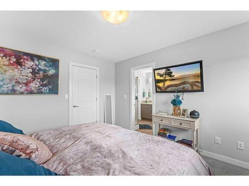 51 Iron Gate Boulevard, Sylvan Lake, AB - Indoor Photo Showing Bedroom