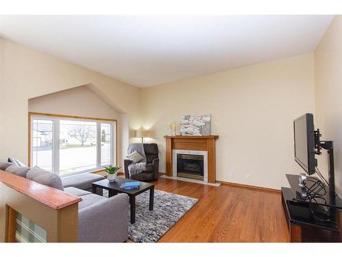 17 Kingston Drive, Red Deer, AB - Indoor Photo Showing Living Room With Fireplace