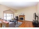 17 Kingston Drive, Red Deer, AB  - Indoor Photo Showing Living Room With Fireplace 