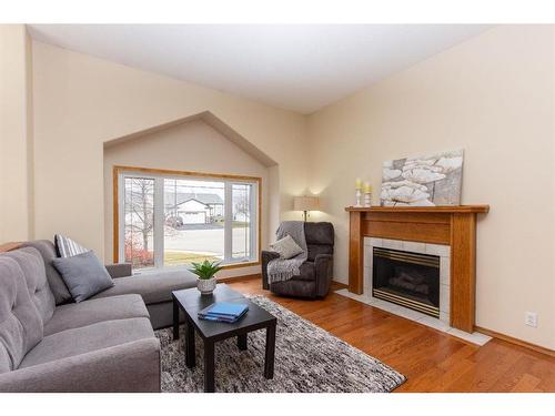 17 Kingston Drive, Red Deer, AB - Indoor Photo Showing Living Room With Fireplace