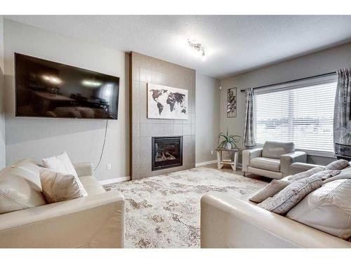 96 Timberstone Way, Red Deer, AB - Indoor Photo Showing Living Room With Fireplace