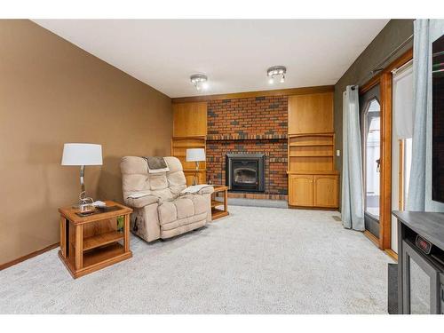 28 Bunn Crescent, Red Deer, AB - Indoor With Fireplace