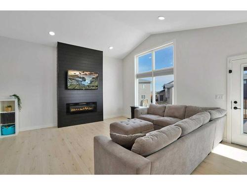 37 Murphy Close, Blackfalds, AB - Indoor Photo Showing Living Room With Fireplace