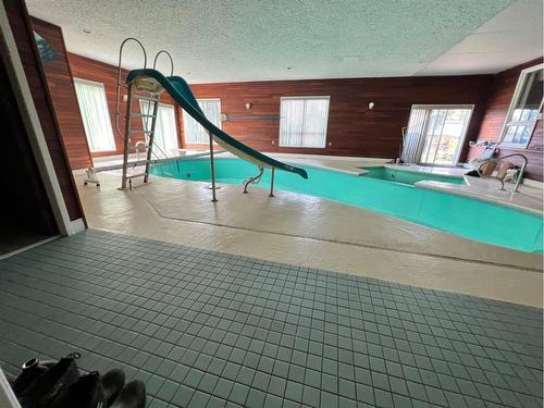 14 Pennington Crescent, Red Deer, AB - Indoor Photo Showing Other Room With In Ground Pool