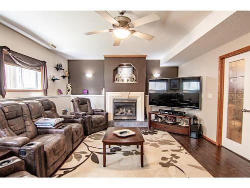 209 Jennings Crescent, Red Deer, AB - Indoor Photo Showing Living Room With Fireplace