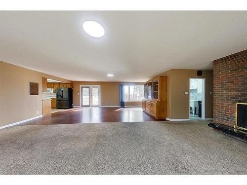 805 35113 Highway, Rural Red Deer County, AB - Indoor With Fireplace