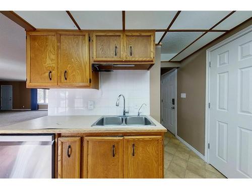 805 35113 Highway, Rural Red Deer County, AB - Indoor Photo Showing Kitchen With Double Sink