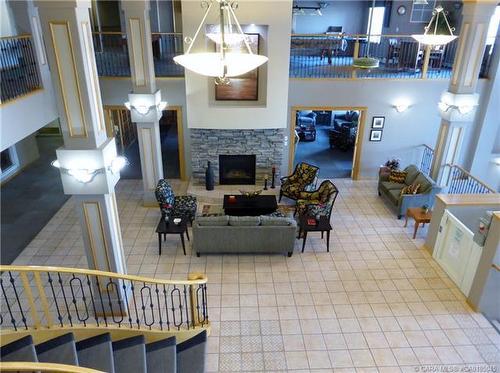 402-4805 45 Street, Red Deer, AB - Indoor With Fireplace