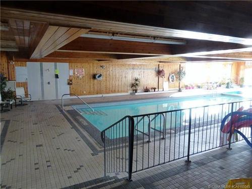 402-4805 45 Street, Red Deer, AB - Indoor Photo Showing Other Room With In Ground Pool