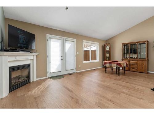4521 69 Street, Camrose, AB - Indoor Photo Showing Living Room With Fireplace
