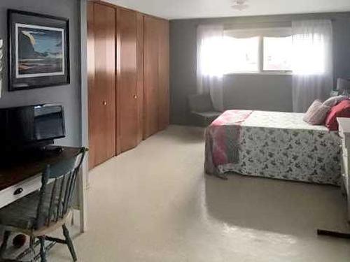 4812 52 Street, Stettler, AB - Indoor Photo Showing Bedroom