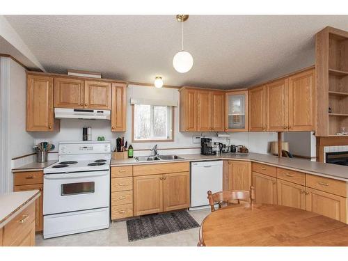 1219 Township Road 402, Rural Lacombe County, AB - Indoor Photo Showing Kitchen With Double Sink