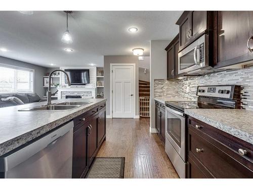 5719 45 Avenue Close, Rocky Mountain House, AB - Indoor Photo Showing Kitchen With Double Sink With Upgraded Kitchen