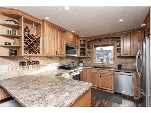 32 Drake Close, Red Deer, AB - Indoor Photo Showing Kitchen With Stainless Steel Kitchen With Double Sink