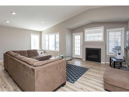 23 Golden Crescent, Red Deer, AB - Indoor Photo Showing Living Room With Fireplace
