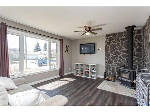 5610 54 Avenue, Lacombe, AB - Indoor Photo Showing Living Room With Fireplace
