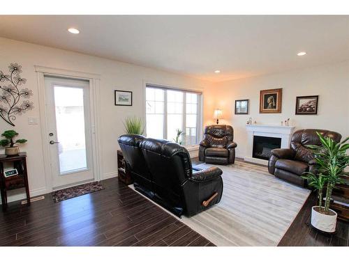 60 Van Slyke Way, Red Deer, AB - Indoor Photo Showing Living Room With Fireplace