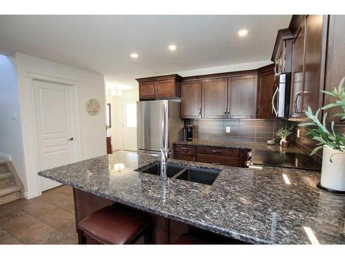 60 Van Slyke Way, Red Deer, AB - Indoor Photo Showing Kitchen With Double Sink With Upgraded Kitchen