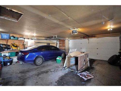 26 Dunlop Street, Red Deer, AB - Indoor Photo Showing Garage