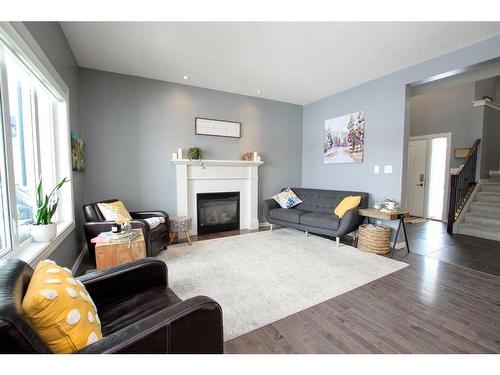 16 Sage Link, Red Deer, AB - Indoor Photo Showing Living Room With Fireplace