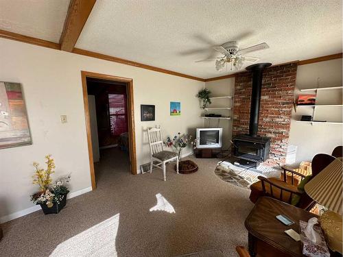 36104B Range Road 250, Rural Red Deer County, AB - Indoor With Fireplace