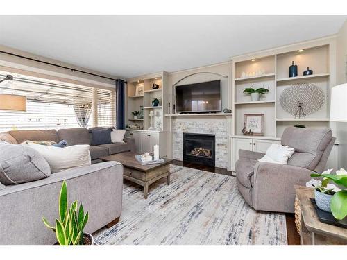 53 Leung Close, Red Deer, AB - Indoor Photo Showing Living Room With Fireplace