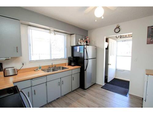 3813 50A Street, Red Deer, AB - Indoor Photo Showing Kitchen With Double Sink