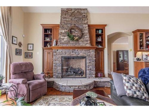 49330 Rr 260, Rural Leduc County, AB - Indoor Photo Showing Living Room With Fireplace
