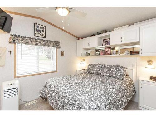 3008-25074 South Pine Lake Road, Rural Red Deer County, AB - Indoor Photo Showing Bedroom
