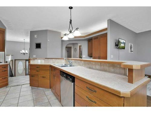 4908 52 Avenue, Rural Red Deer County, AB - Indoor Photo Showing Kitchen With Double Sink