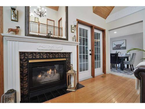 15 26540 Highway 11, Rural Red Deer County, AB - Indoor Photo Showing Living Room With Fireplace