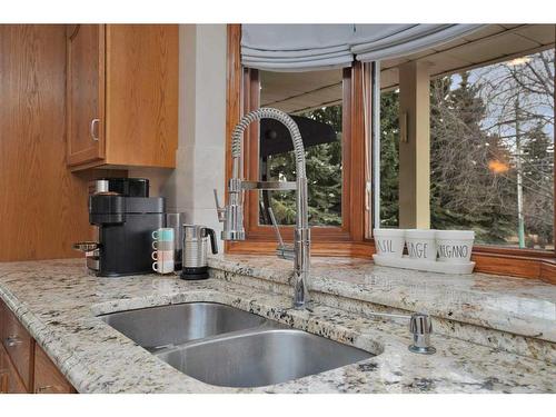 15 26540 Highway 11, Rural Red Deer County, AB - Indoor Photo Showing Kitchen With Double Sink