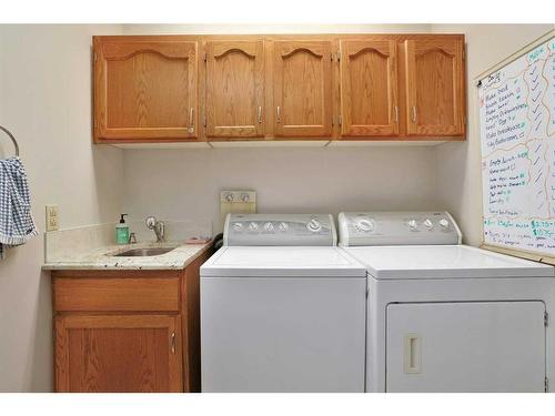15 26540 Highway 11, Rural Red Deer County, AB - Indoor Photo Showing Laundry Room